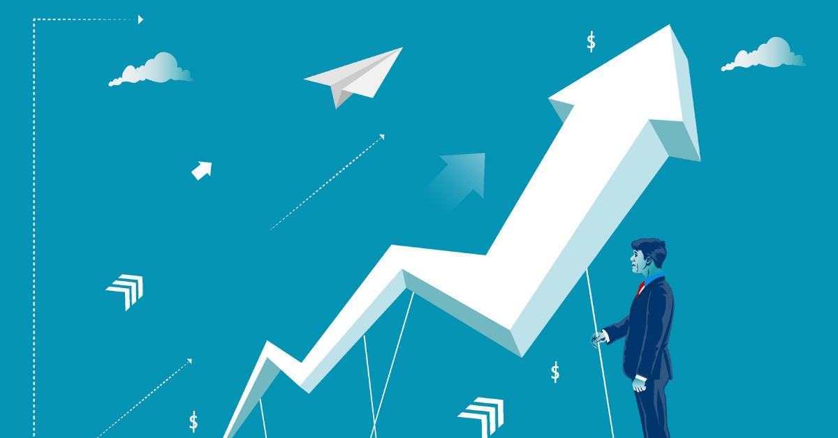 Businessman standing on a graph symbolizing innovation and growth in business